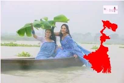 Two girl enjoying the rain in a boat of west bengal